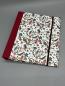 Preview: Ringbuch Planer A5 rot Blumen Tiere Gummiband Front